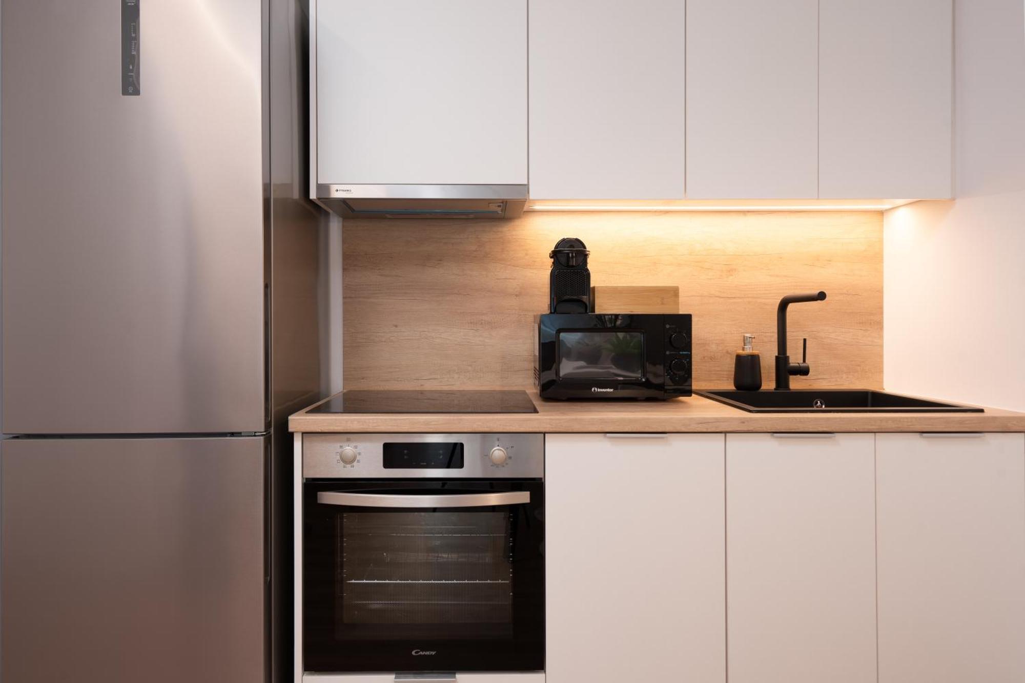 Kosmos Luxury Residences Aten Rum bild