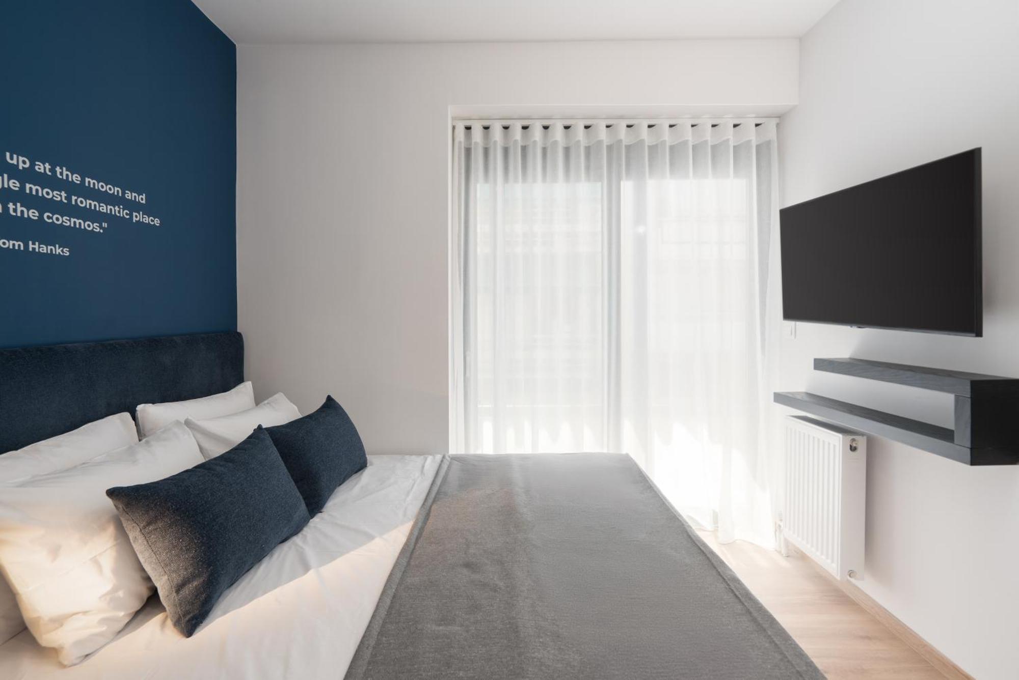 Kosmos Luxury Residences Aten Rum bild