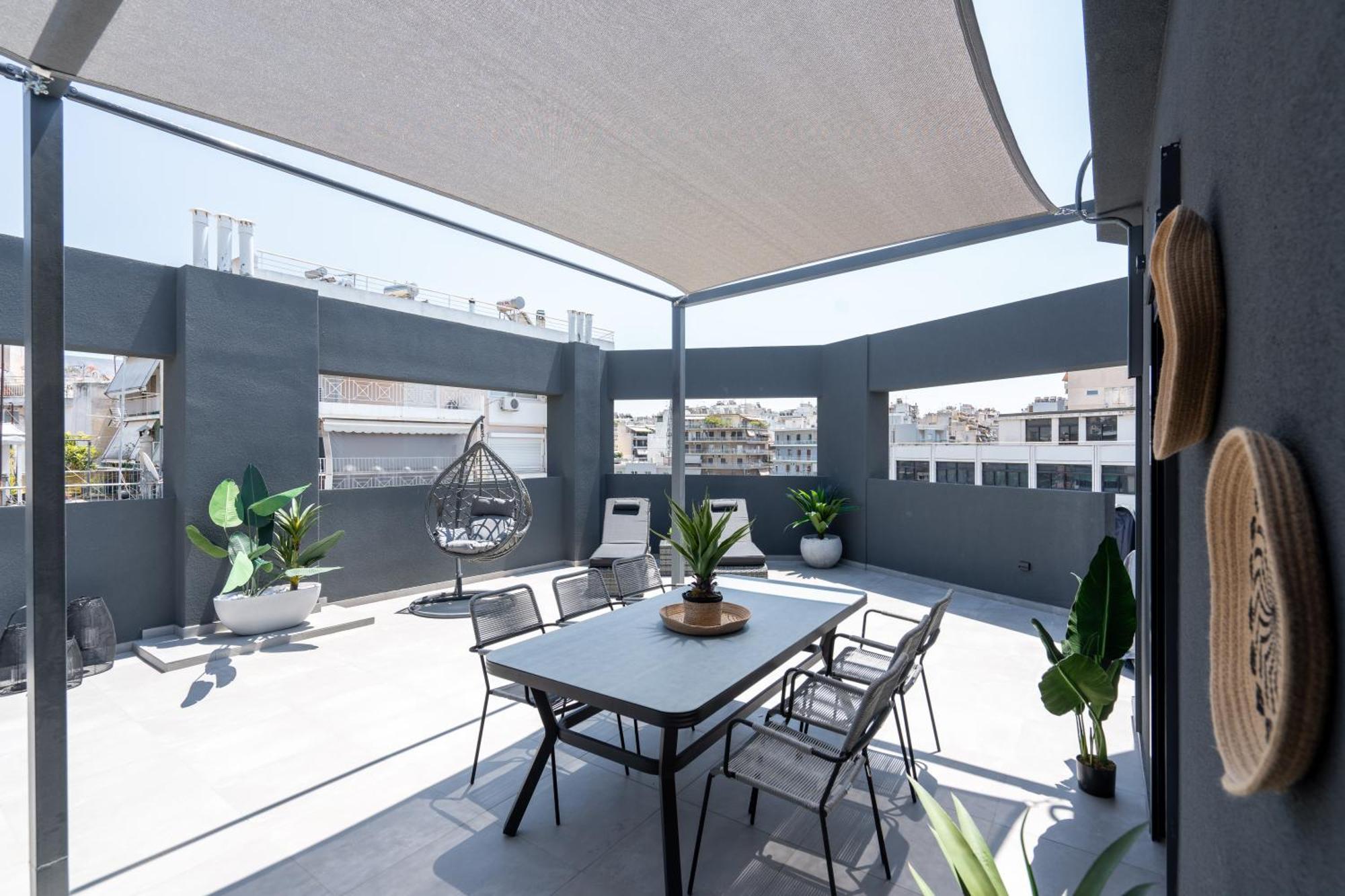 Kosmos Luxury Residences Aten Rum bild